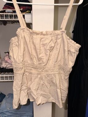 Cream Sleeveless Smocked Peplum Top